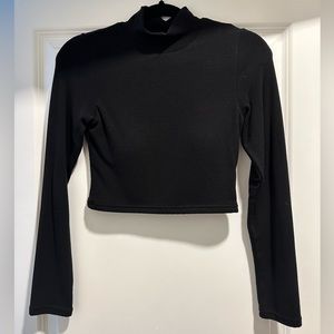 Klassy network turtleneck cropped top in size medium